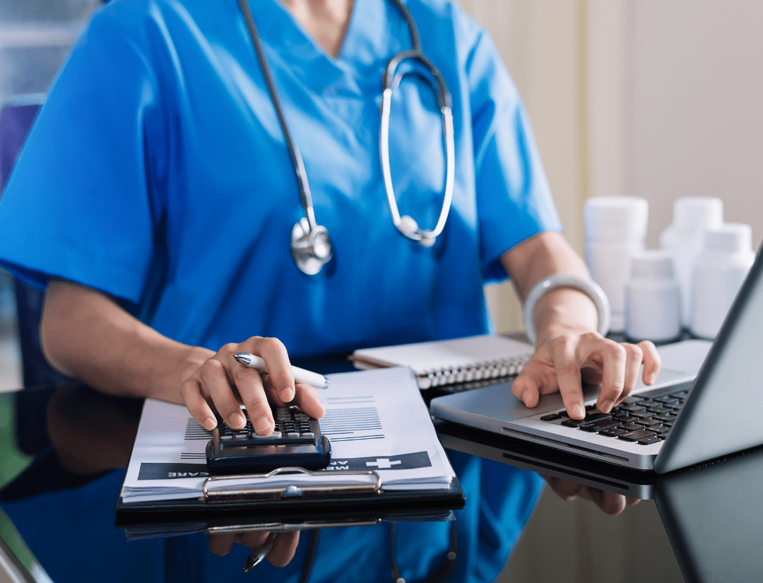 hospital worker working with clipboard and computer to create water quality management team